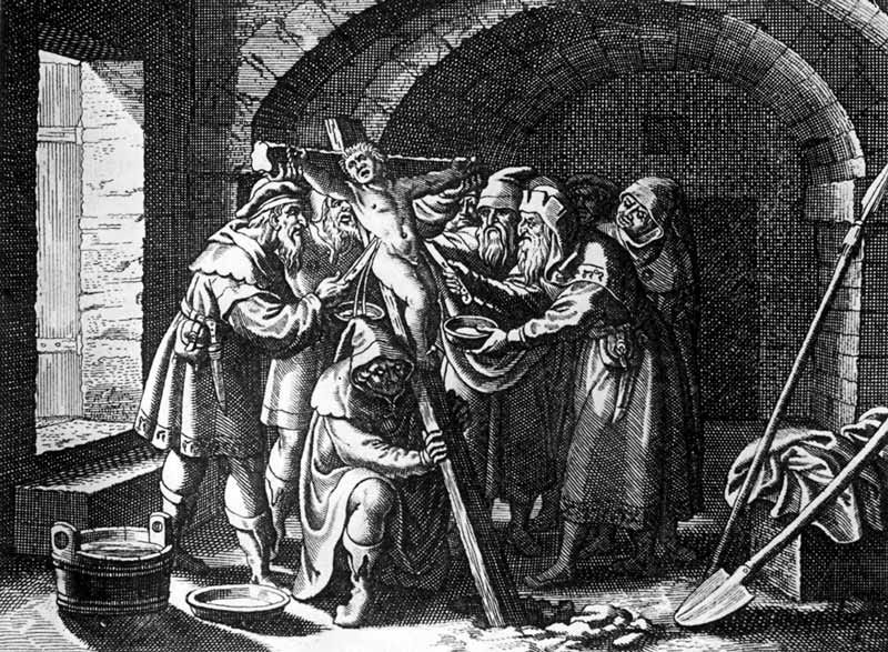 Black-and-white illustration depicting a medieval antisemitic blood libel scene. Several men in robes and hats surround a young, naked child tied to a wooden structure, with one man holding a bowl as another appears to pierce the child. The setting is a dim stone-walled chamber with an arched ceiling, an open doorway emitting light, and tools like a shovel and bucket on the floor. The image conveys a dark and violent atmosphere.